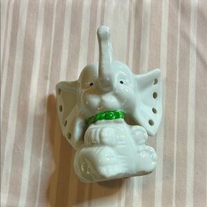 White Elephant Ceramic Figurine with holes in ears.